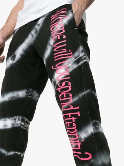 Shop Ashley Williams Tie Dye Slogan Print Cotton Track Pants In Black