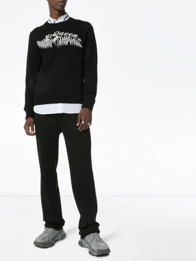 Shop Alexander Mcqueen Embroidered-logo Sweatshirt In Black