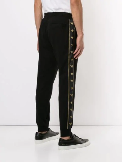 Shop Emporio Armani Logo Patch Track Pants In Black