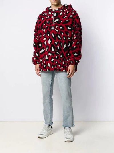 Shop Msgm Animal Print Shearling Hooded Sweater In Red