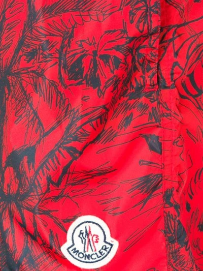 Shop Moncler Scribble Tropical Print Swim Shorts In Red