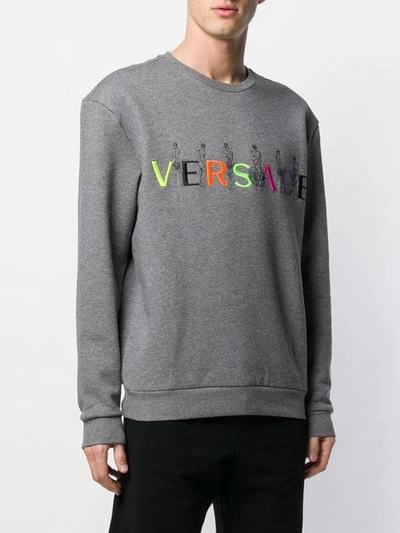 Shop Versace Embroidered Logo Sweatshirt In A811