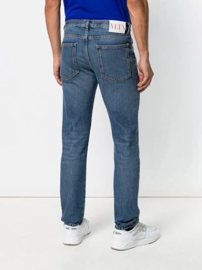 Shop Valentino Washed Slim Fit Jeans In Blue