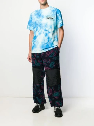 Shop Aries Paisley Print Track Pants In Blue