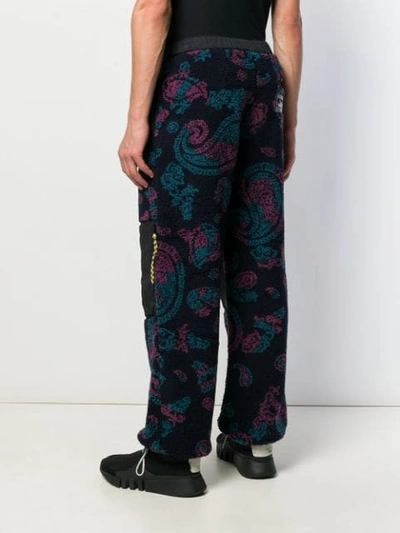 Shop Aries Paisley Print Track Pants In Blue