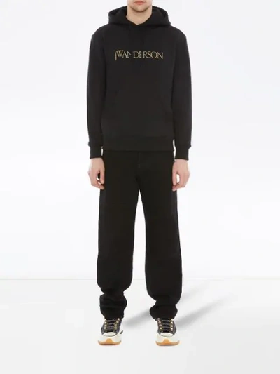 Shop Jw Anderson Logo Embroidered Hoodie In Black