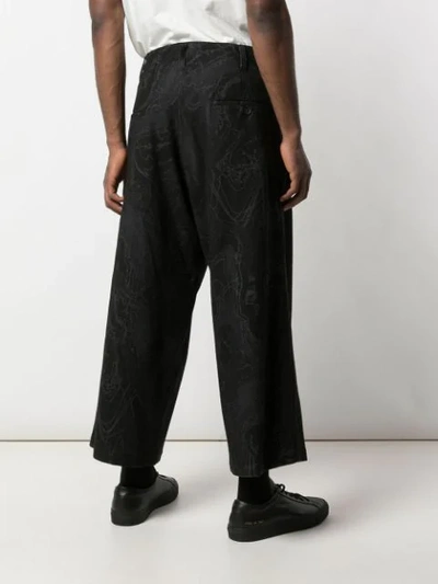 Shop Yohji Yamamoto Cropped Loose Fit Trousers In Black