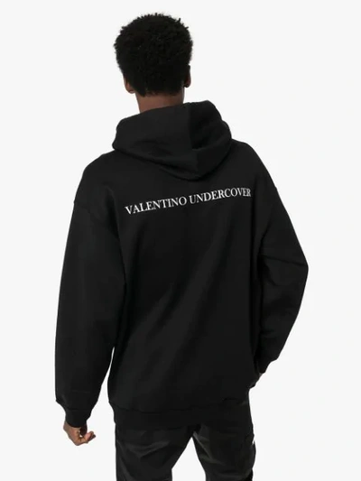 Shop Valentino X Undercover Ufo Face Printed Hoodie In Black