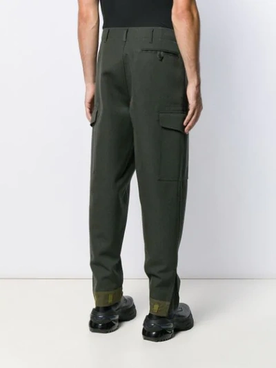 Shop Loewe Contrast Hem Tapered Trousers In Green