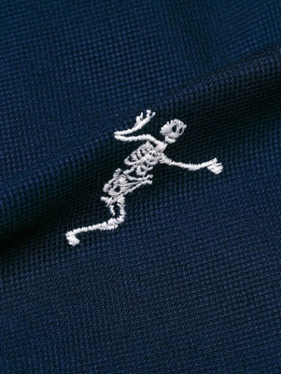 Shop Alexander Mcqueen Dancing Skeleton Embroidered Polo Shirt - Blue
