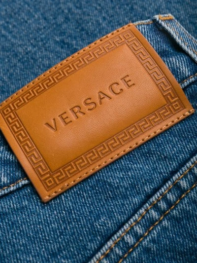 Shop Versace Straight Leg Denim Jeans In Blue