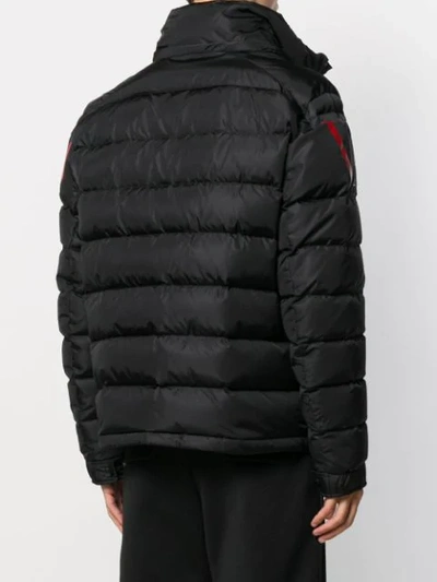 Shop Valentino Logo Print Padded Jacket In 黑色