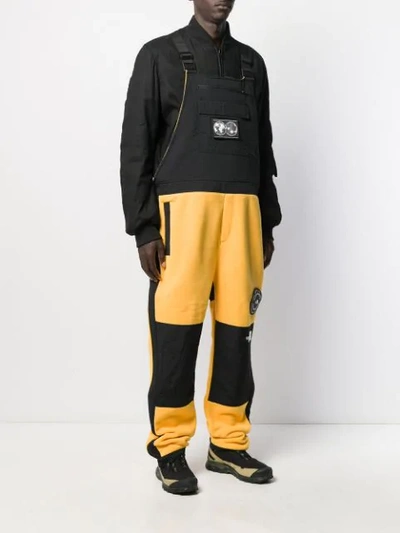 Shop The North Face Two-tone Logo Patch Jumpsuit In Yellow