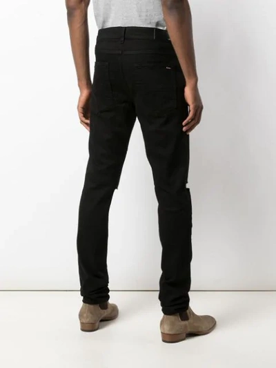 Amiri Distressed Slim Fit Jeans In Black