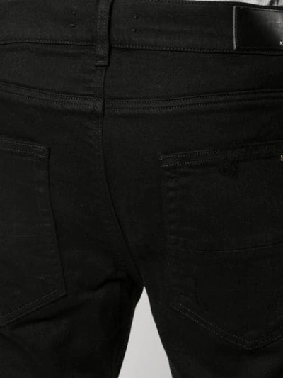 Amiri Distressed Slim Fit Jeans In Black