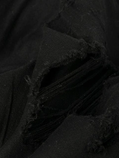 Amiri Distressed Slim Fit Jeans In Black