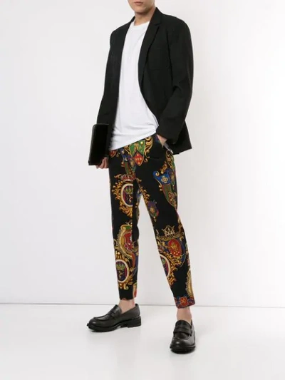 Shop Dolce & Gabbana Printed Trousers In Black