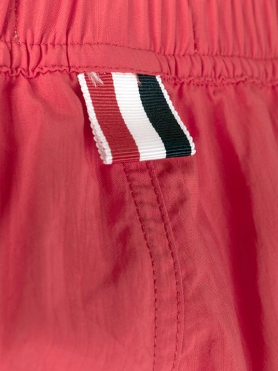 Shop Thom Browne Snap Front Swim Short In Solid Swim Tech W/ 4 Bar Print In 600 Red