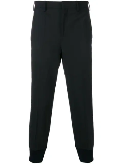 Shop Neil Barrett Tapered Cropped Trousers In Blue