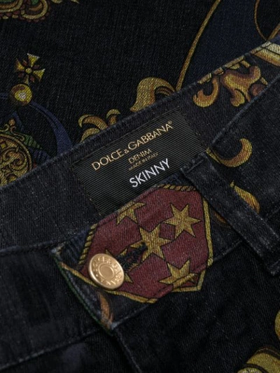 Shop Dolce & Gabbana Crest Print Jeans In Blue