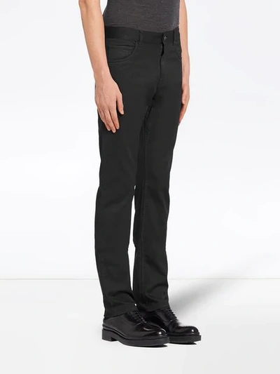 Shop Prada Flared Jeans - Black