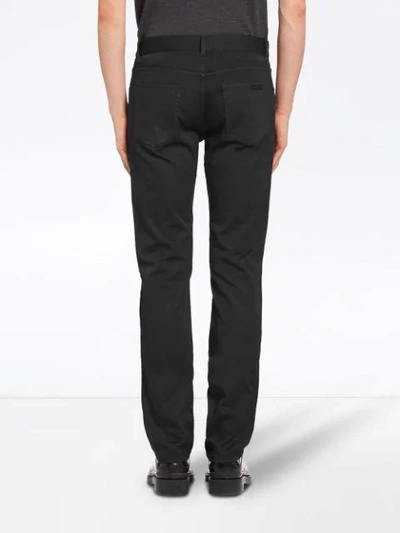 Shop Prada Flared Jeans - Black