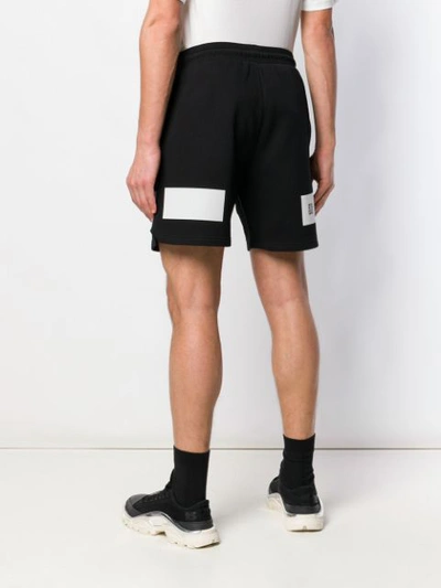 Shop Givenchy Contrast Print Shorts In Black