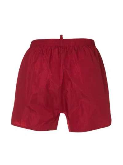 Shop Dsquared2 Logo Printed Swim Shorts In Red
