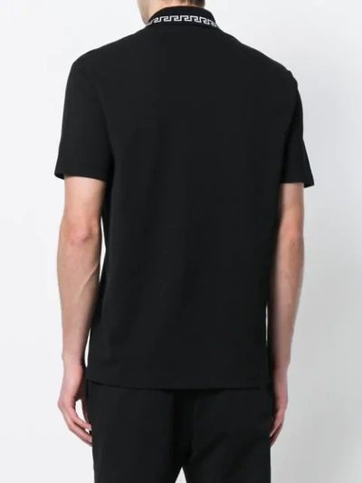 Shop Versace Grecca Polo Shirt In Black
