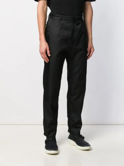 Shop Prada Gabardine Nylon Trousers In Black