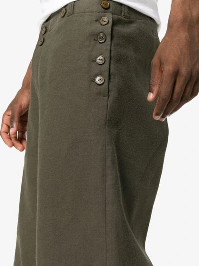 Shop Ann Demeulemeester Wide Leg Button Detail Trousers In Green