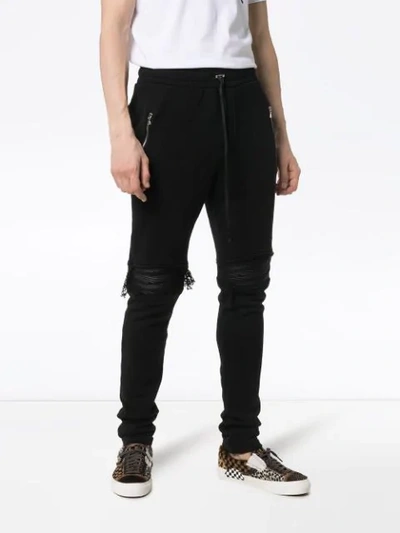 AMIRI DISTRESSED TRACK PANTS - 黑色