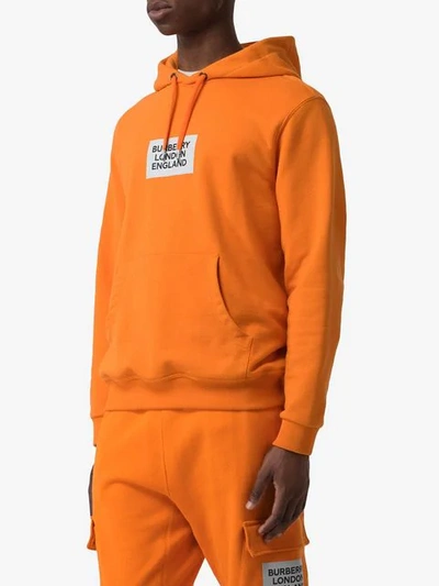 Shop Burberry Logo Print Cotton Hoodie In Orange