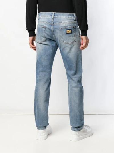 Shop Dolce & Gabbana Cropped Distressed Jeans In Blue
