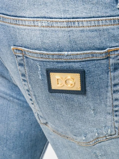 Shop Dolce & Gabbana Cropped Distressed Jeans In Blue