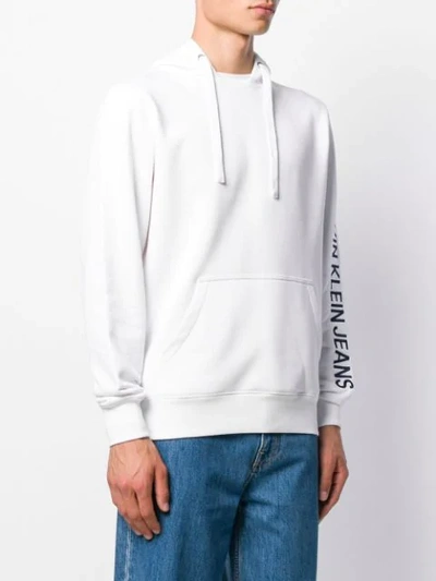 Shop Calvin Klein Jeans Est.1978 Logo Drawstring Hoodie In White