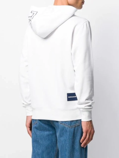 Shop Calvin Klein Jeans Est.1978 Logo Drawstring Hoodie In White