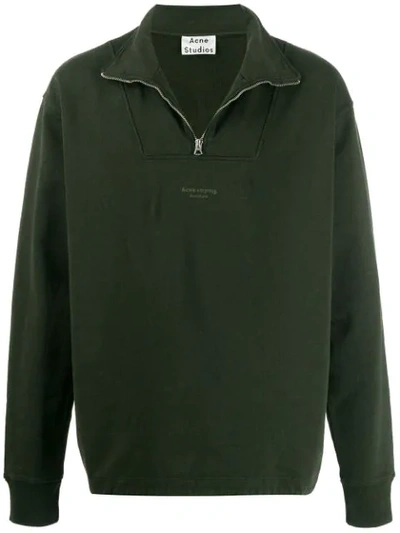 Shop Acne Studios Inverted Logo Zipped Polo Sweater In Green