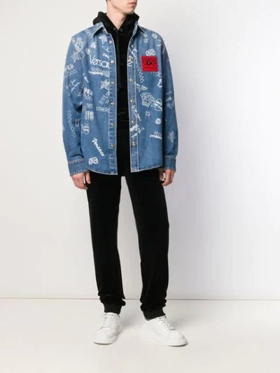 Shop Versace Printed Denim Shirt In Blue