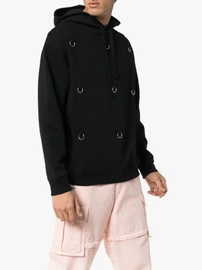 Shop Raf Simons Ring-embellished Hoodie In Black