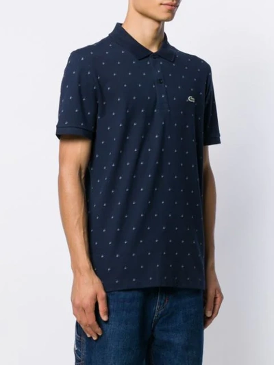 Shop Lacoste Patterned Polo Shirt In Blue