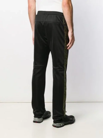 Shop Fendi Logo-stripe Tracksuit Trousers In Black
