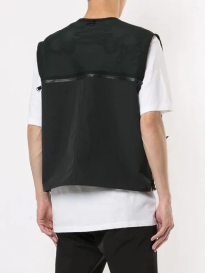 Shop Undercover Zipped-up Vest In Black