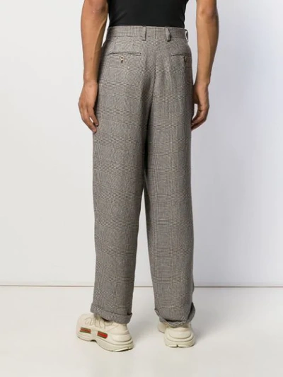 Shop Gucci Loose-fit Check Trousers In Black