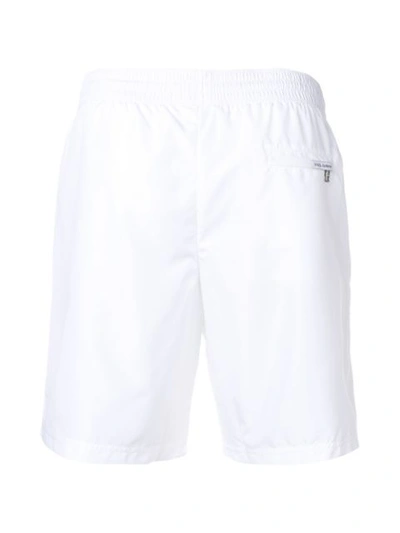 Shop Dolce & Gabbana Logo Swimming Shorts In White
