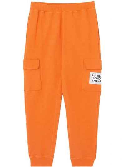 Shop Burberry Logo Patch Track Pants In Orange