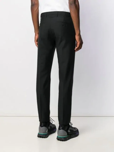 Shop Acne Studios Fitted Tapered Trousers In Black