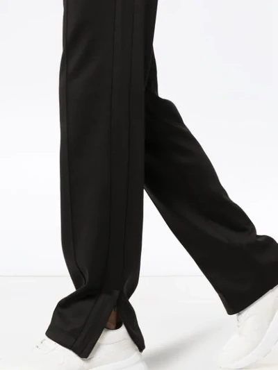 Shop Valentino Print Track Pants - Black