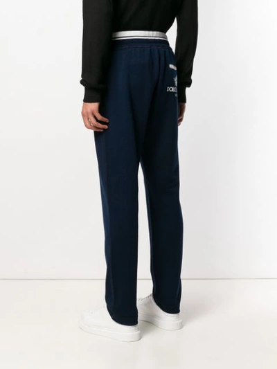 Shop Dolce & Gabbana Logo Embroidered Track Trousers In Blue