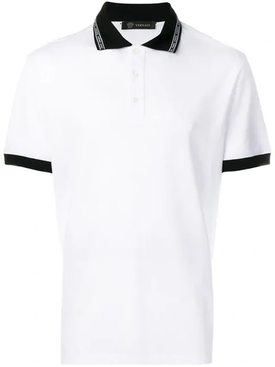 Shop Versace Logo Collar Polo Shirt In White